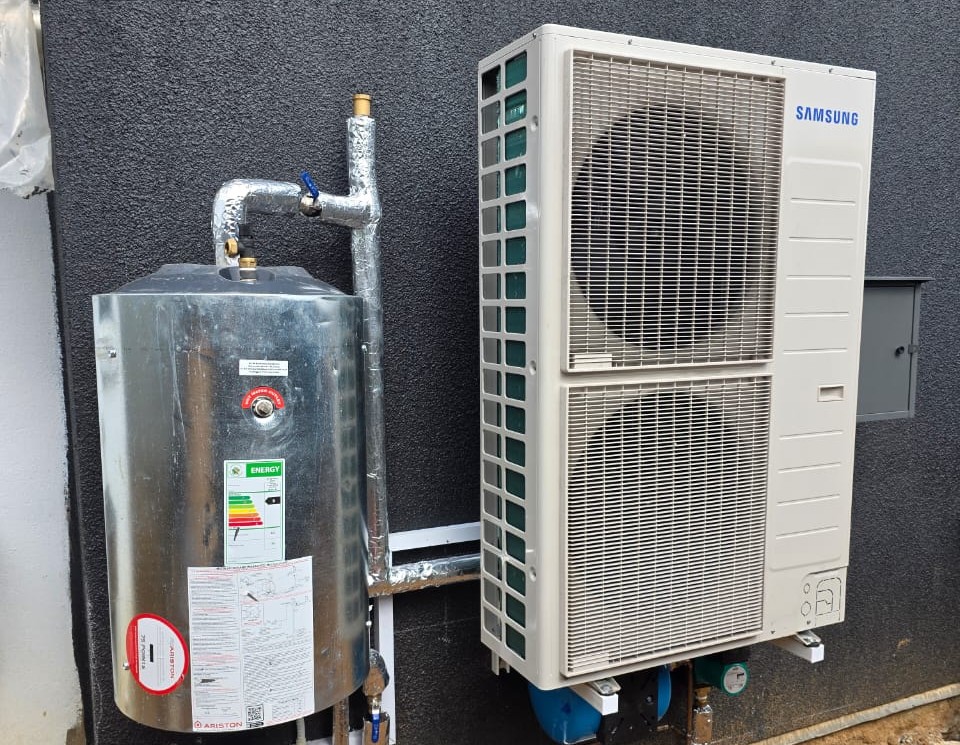 Samsung inverter heat pump and Ariston buffer cylinder installed by Synergy Energy Solutions as the heat source for a hydronic underfloor heating system