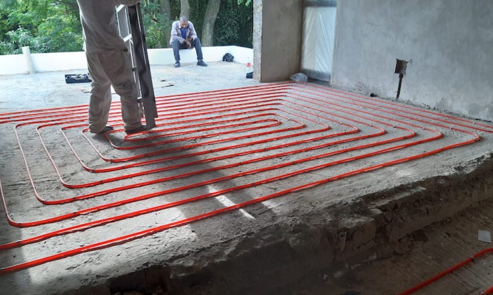 Underfloor heating installation in progress