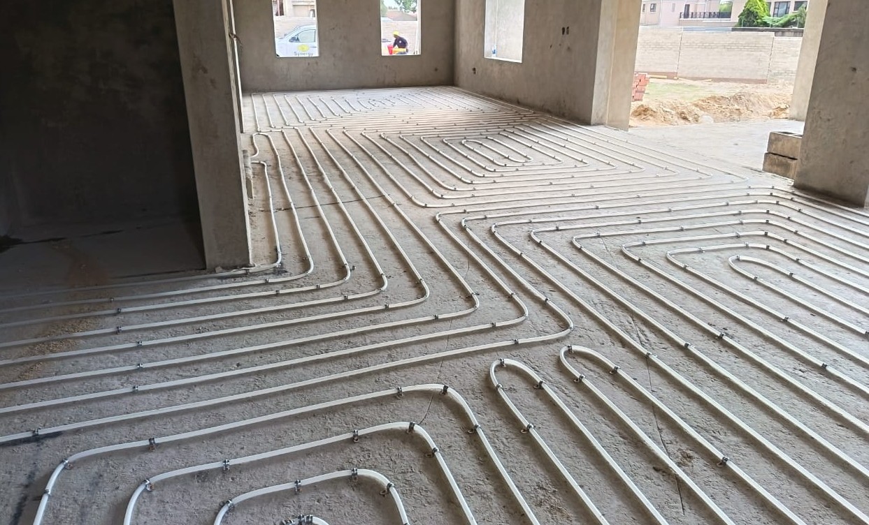 Whole-home PEX-EVO oxygen-barrier underfloor heating pipe layout installed by Synergy Energy Solutions in a South African new build